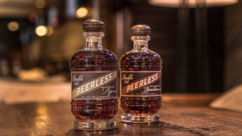Two bottles of Kentucky Peerless whiskey