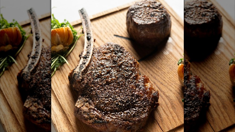 Ribeye and filet on wooden board