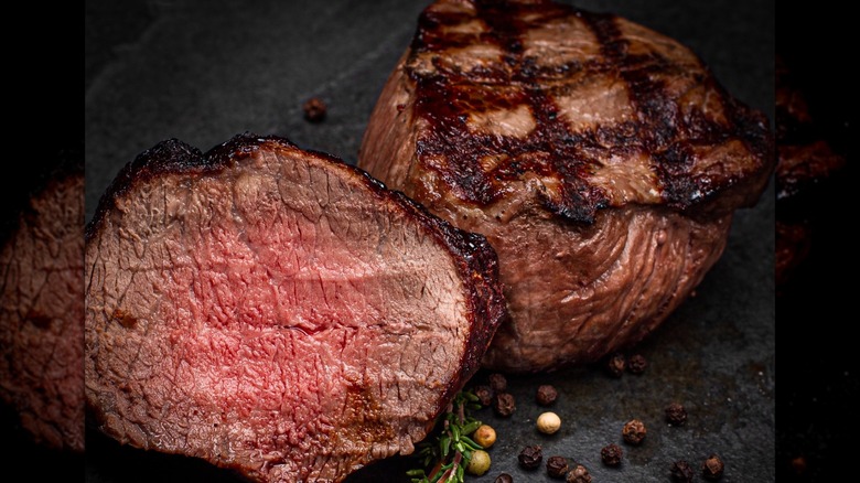 Two filets, one whole, one sliced showing the inside