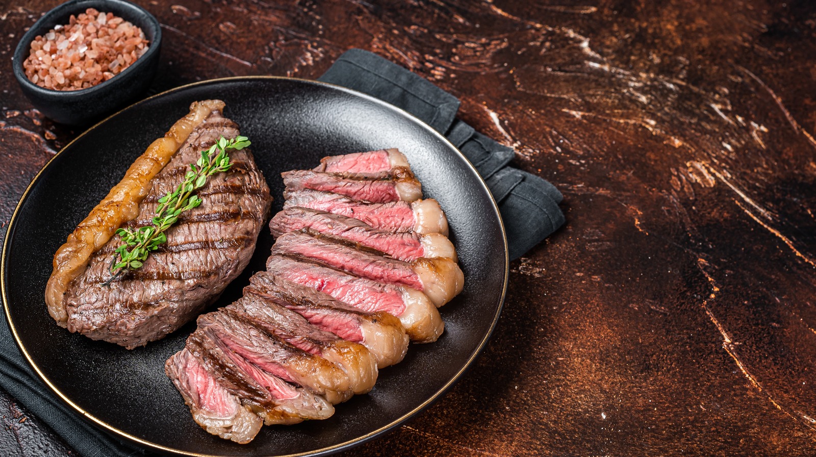 The Absolute Best Steakhouse Sirloin Steaks - Tasting Table