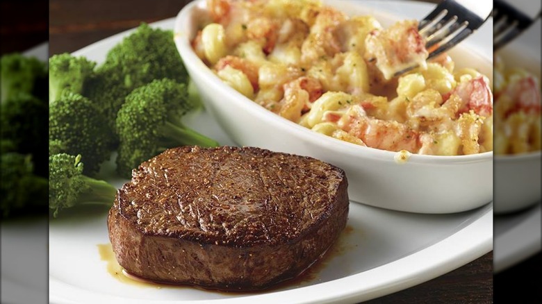 Sirloin on plate with broccoli and lobster mac and cheese