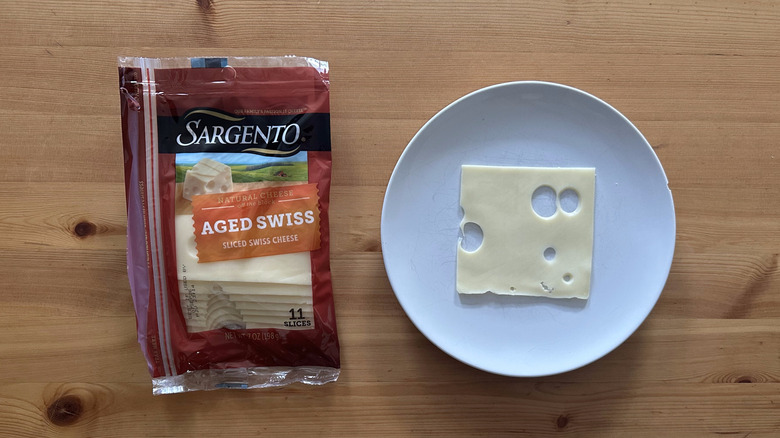 Sliced Sargento Aged Swiss cheese
