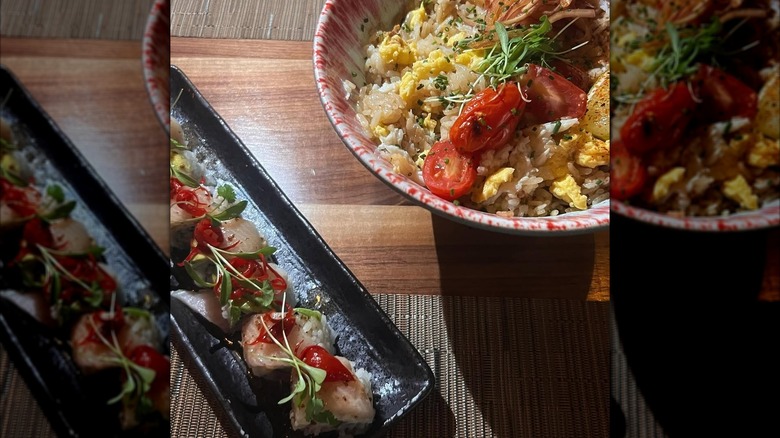 Sushi roll with a side of egg fried rice