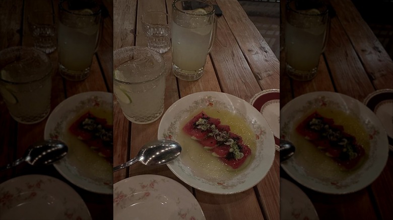 Garnished sashimi on a white plate