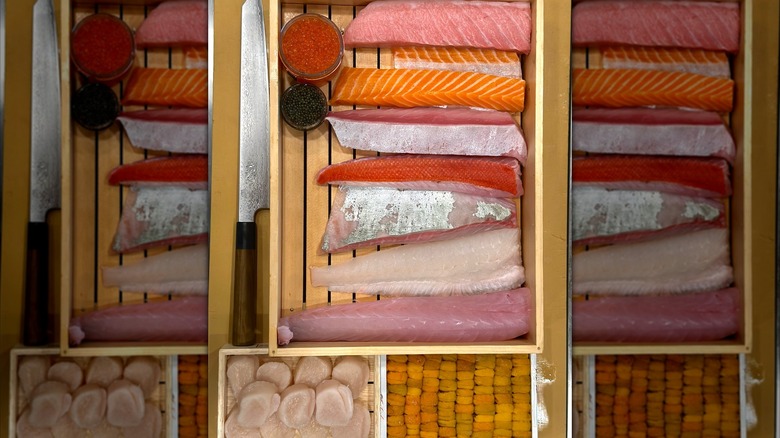 Assorted sashimi in a wooden bento box