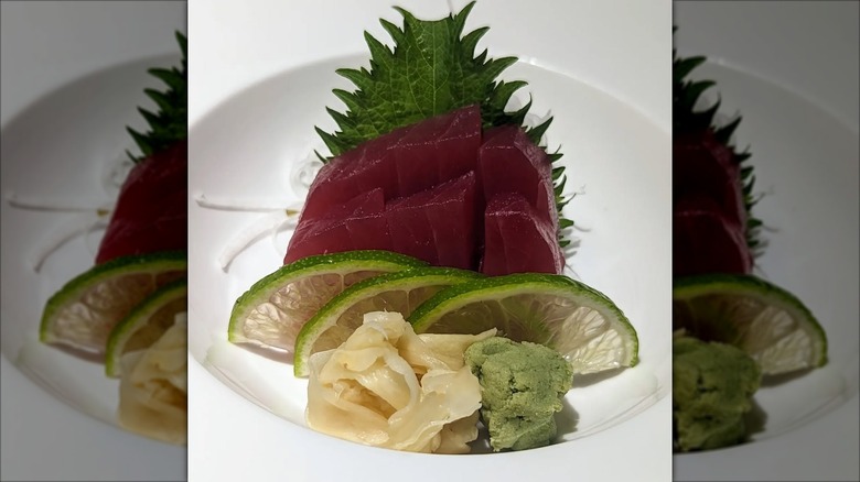 Sashimi with lime, ginger, and wasabi