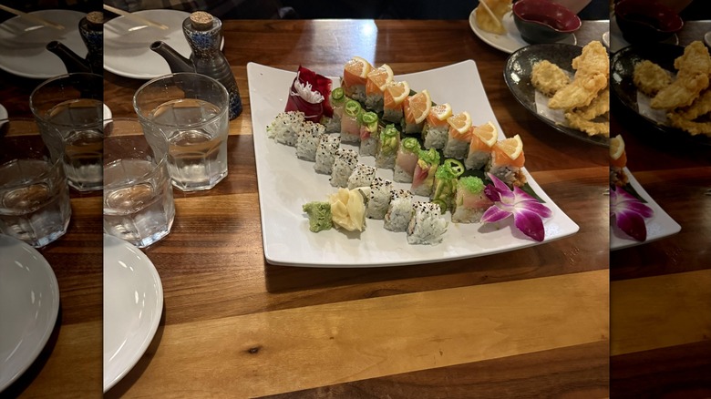 Plate of assorted uramaki rolls