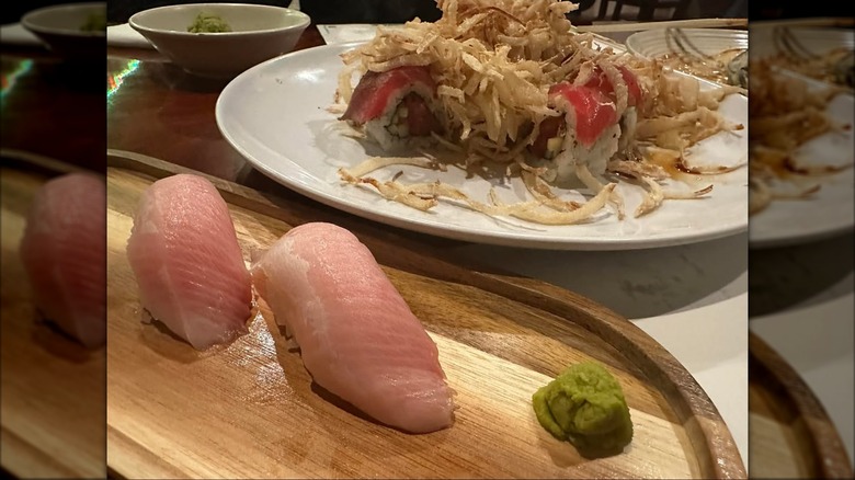 Nigiri rolls and uramaki topped with fried shredded potato