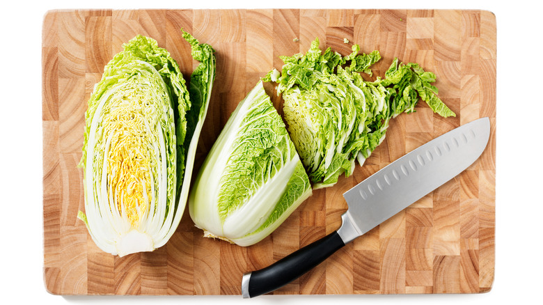 Napa cabbage sliced on a chopping board