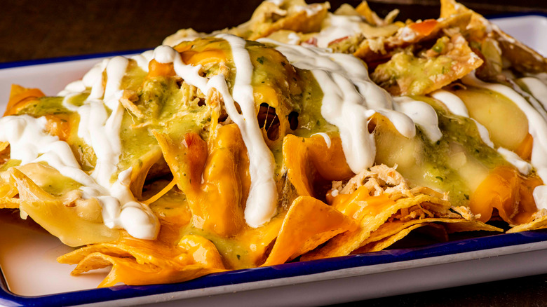 nachos covered in cheese