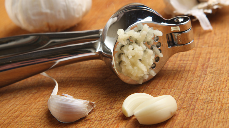 Crushed garlic in press