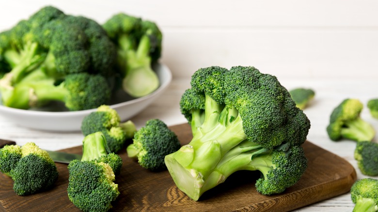 Clean broccoli on a cutting board