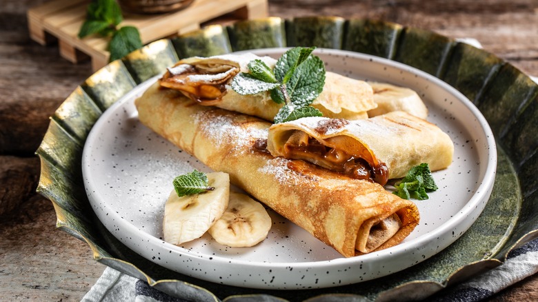 Crepes rolled with chocolate and mint