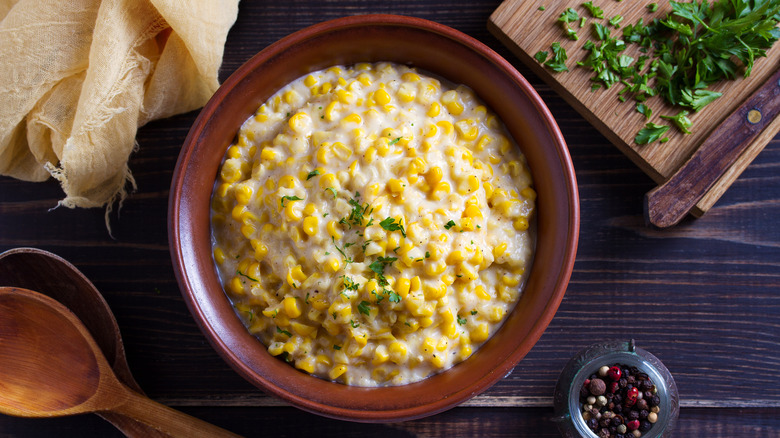 A bowl of creamed corn.