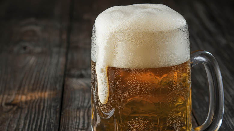 highly carbonated beer with foam