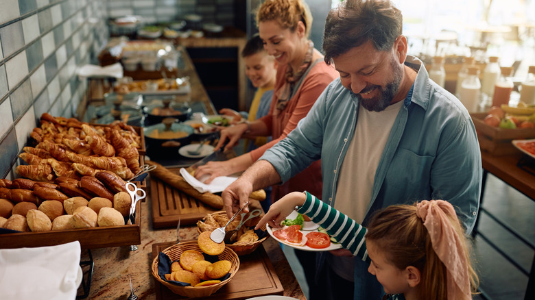 Family at a breakfast buffet