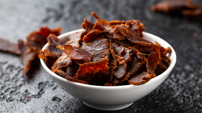 Dried beef jerky in white bowl