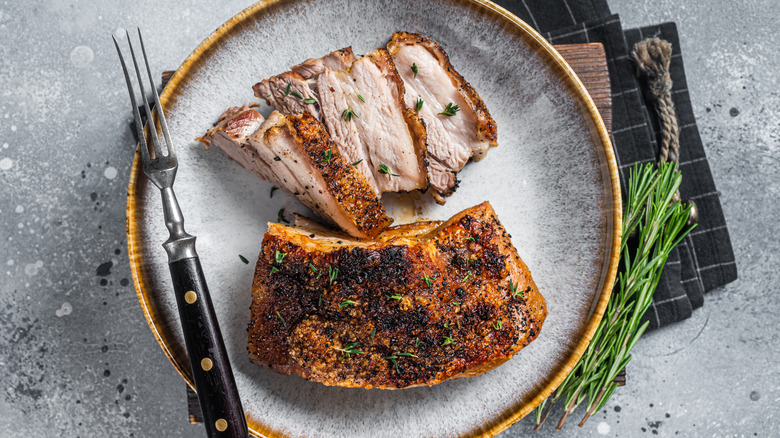 A plate of cooked pork belly