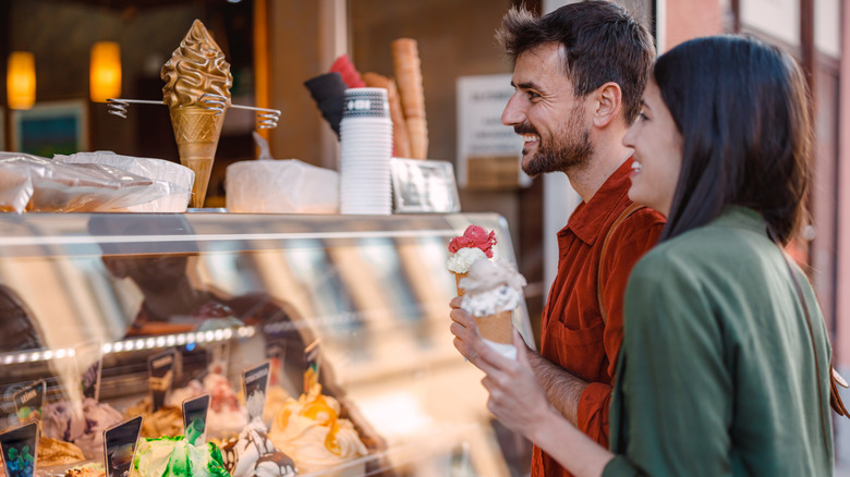 Couple inside ice cream shop