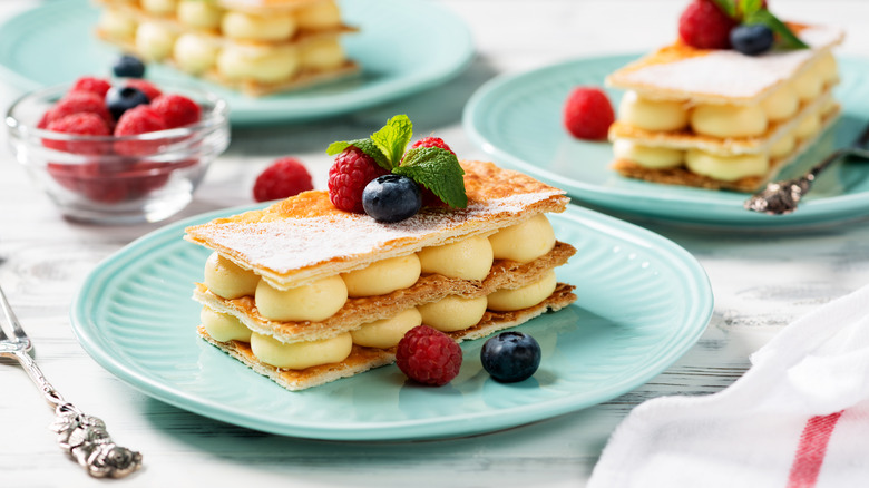 Three plates holding mille feuille