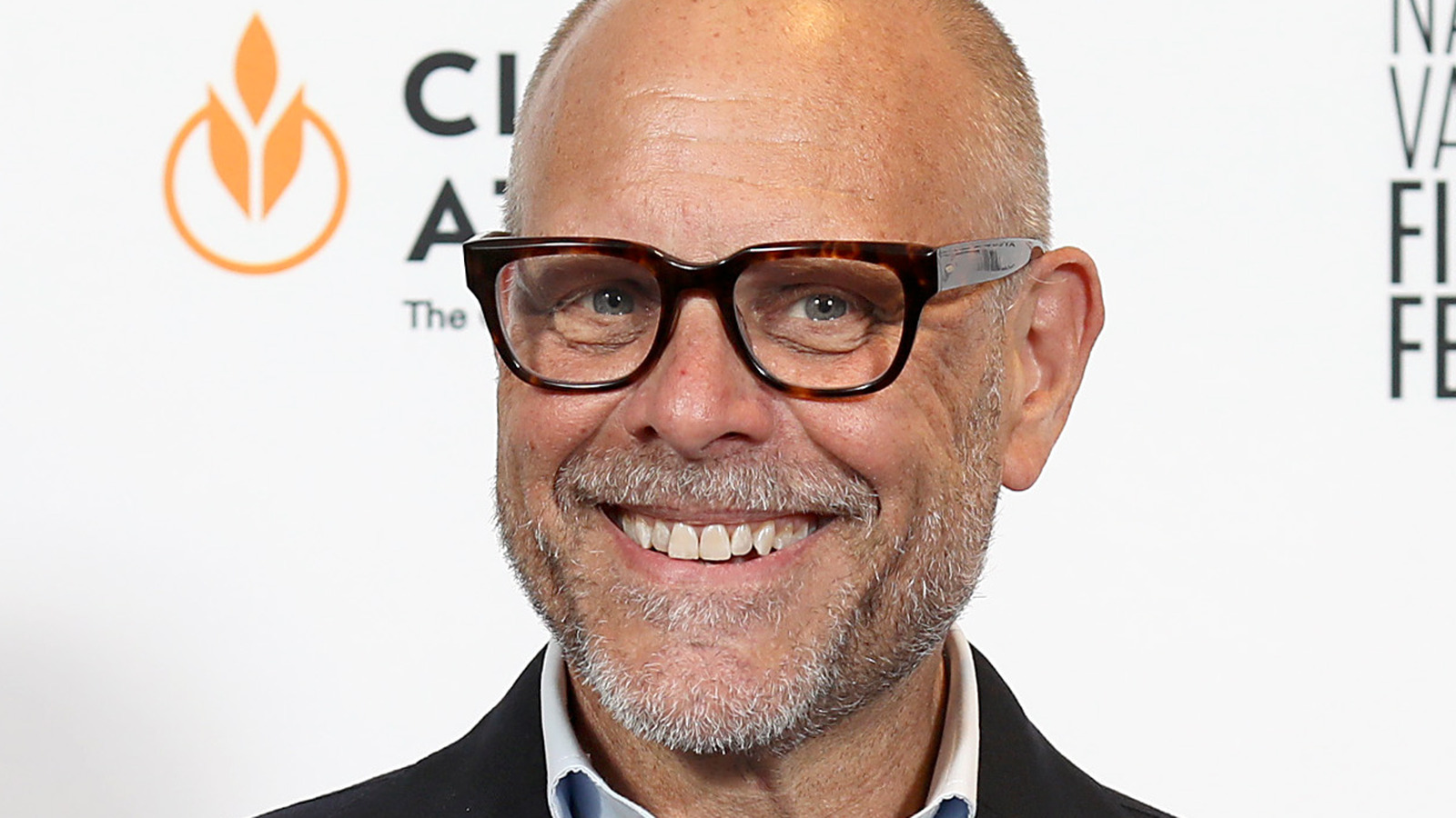 The Appliance Alton Brown Uses To Avoid Tears When Chopping Onions