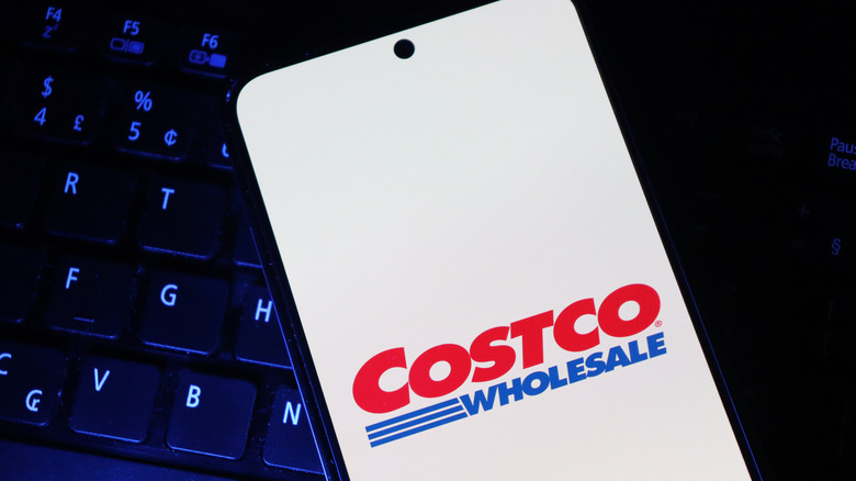 Costco app screen against dark keyboard background