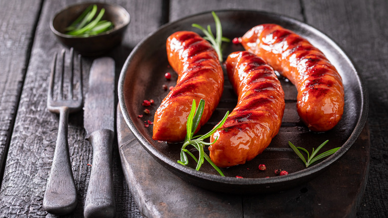plate of sausages and fork