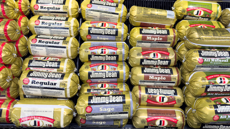 Grocery store freezer lined with rows of Jimmy Dean sausages