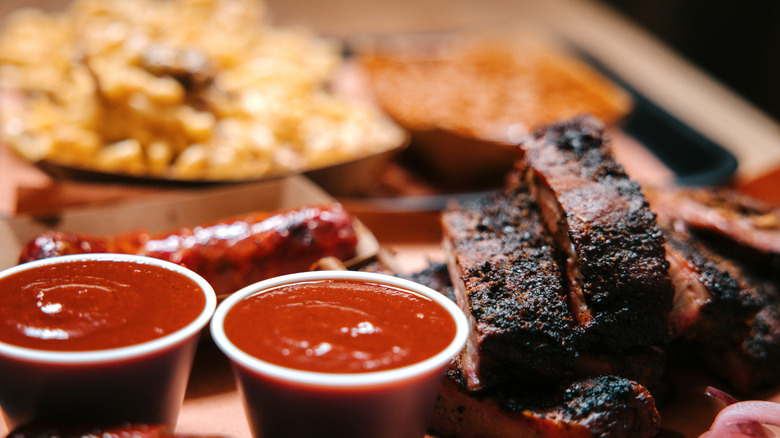 Barbecue food and condiments on a platter