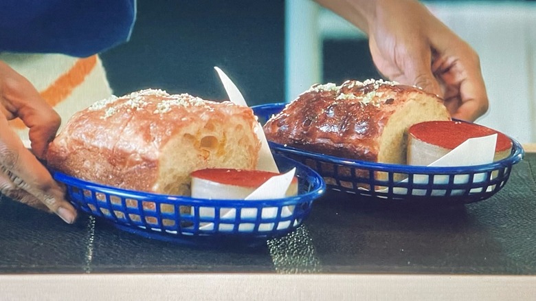 Two baskets of focaccia with a red spread in "The Bear" Season 5