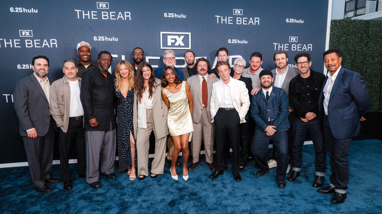 Cast and crew of "The Bear" posing for a photo at an event