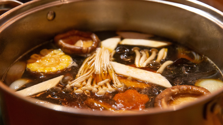 mushrooms simmering in pot