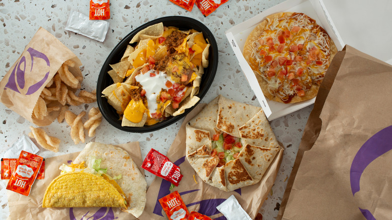 Taco Bell food items with sauces and bags