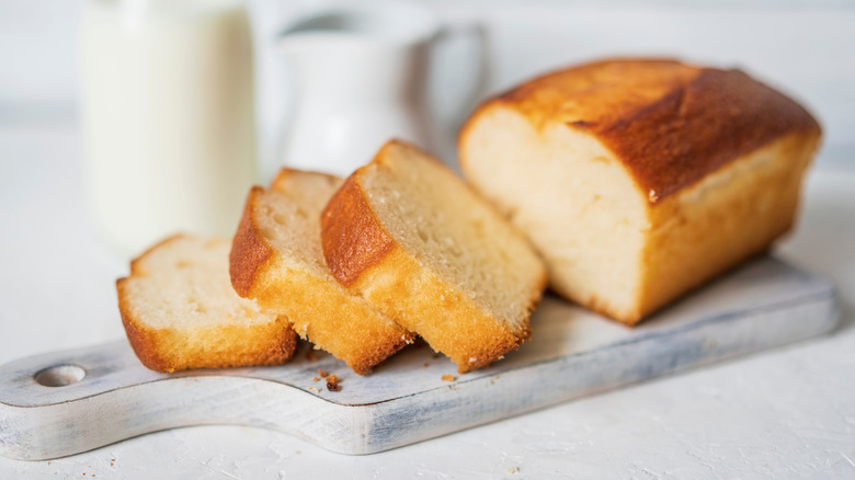 Pound cake with milk in background