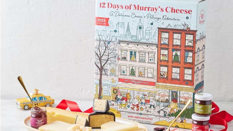 Murray's cheese calendar with cheeses and jam jars opened in the front