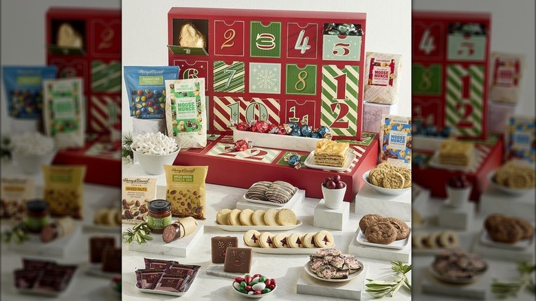plates and packages of cookies and sweets in front of the advent calendar