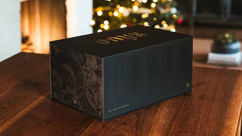 a dark rectangular Onyx box on a wooden table