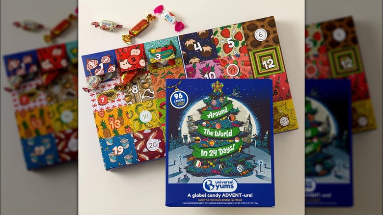 two calendars, one front display and another opened behind it with candies spilling out