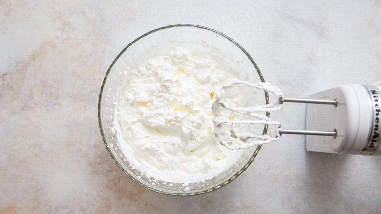 whipped cream in mixing bowl