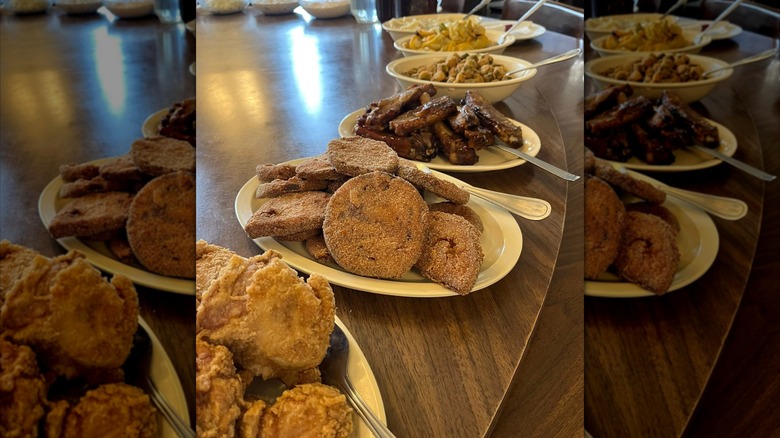 Assortment of southern-style dishes on lazy susan round table