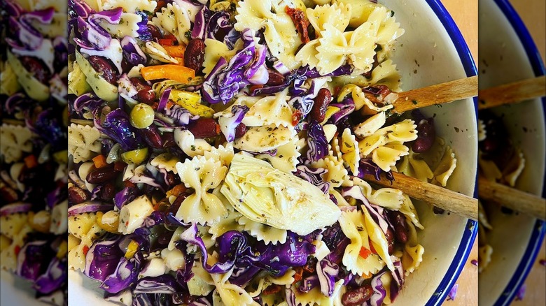 Colorful pasta dish with red cabbage in bowl