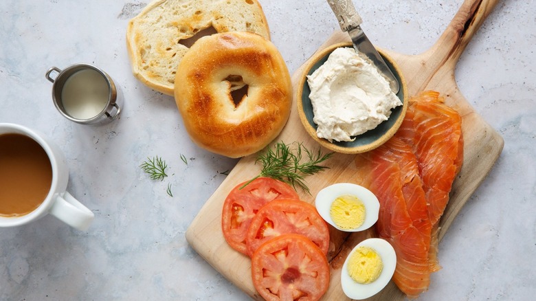 Bagel with cream cheese, tomatoes, hard-boiled eggs, and lox