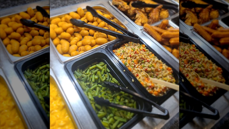 Assortment of veg and fried foods on buffet line