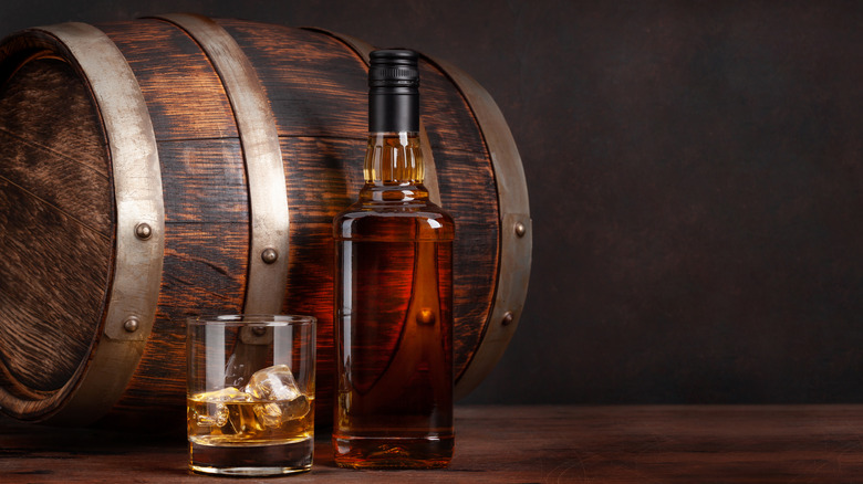 glass bottle whiskey barrel brown
