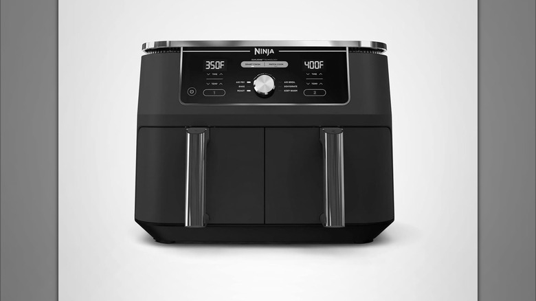 The Ninja DZ401 Foodi 10 Quart 6-in-1 DualZone XL 2-Basket Air Fryer shown on a plain background