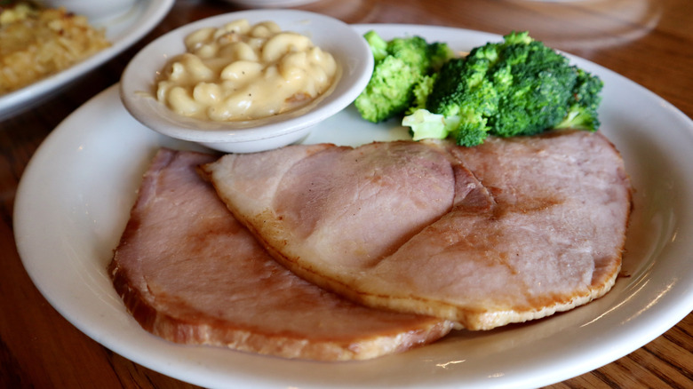 Cracker Barrel Ham Dinner with macaroni and cheese and broccoli on white plate