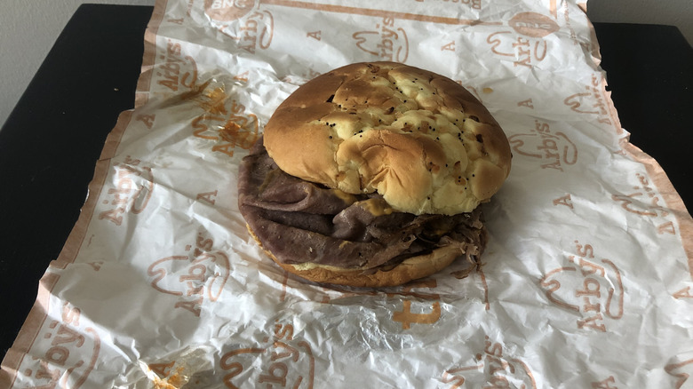 Arby's Beef 'n Cheddar﻿ sandwich on wrapping paper