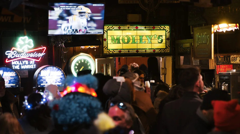 A crowd of Mardi Gras partiers hanging out in Molly's at the Market.