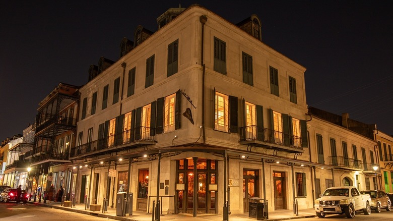 The exterior of Napoleon House at night.