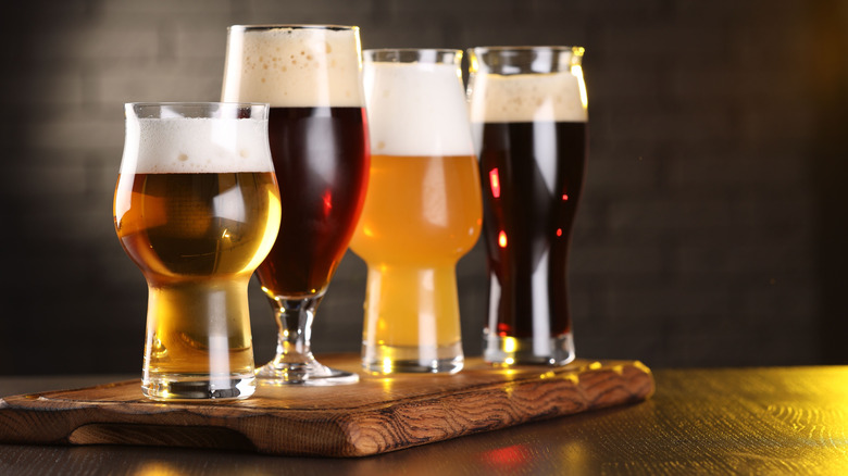 Different types of beer on a wood table